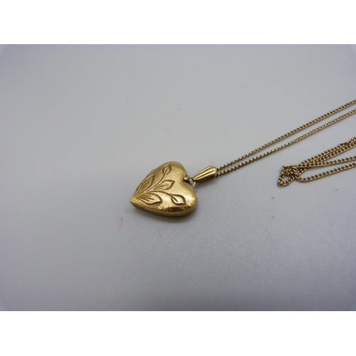 1014 - A 9ct gold locket and chain, 6.9g