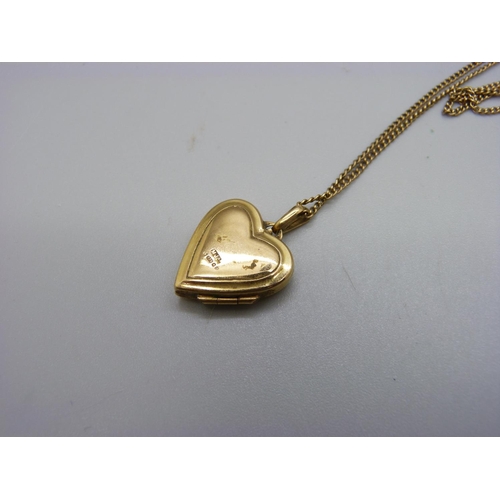 1014 - A 9ct gold locket and chain, 6.9g