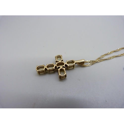 1016 - A 9ct gold an opal set cross pendant and chain, 5.2g