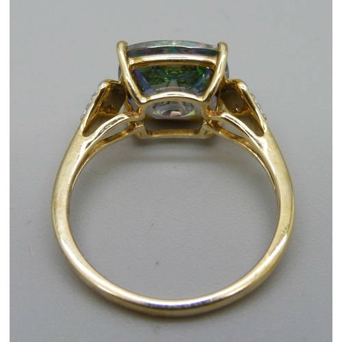 1024 - A 9ct gold quasar cut topaz and diamond ring, signed Lehrer, with certificate, 2.9g, N