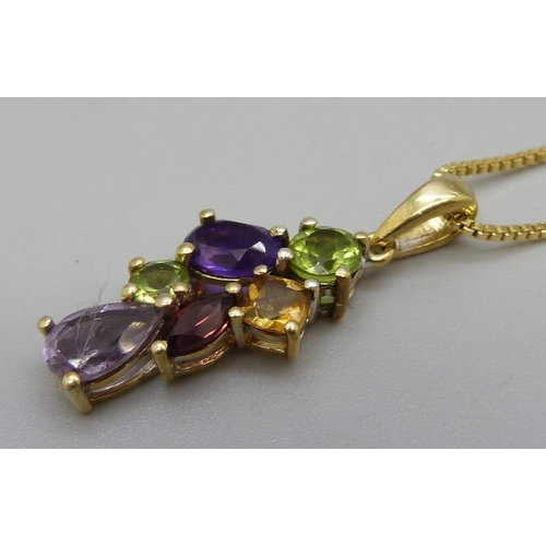 1028 - A silver gilt, peridot, citrine, garnet and amethyst pendant and chain