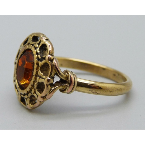 1037 - A gold tone stone set ring, U