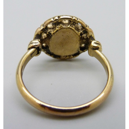 1037 - A gold tone stone set ring, U