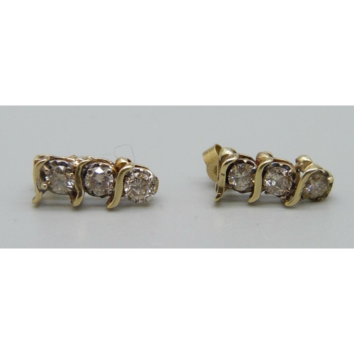 1040 - A pair of 9ct gold and diamond earrings, approximately 1.25ct diamond weight