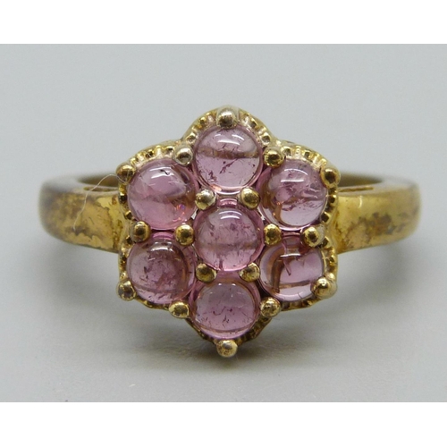 1045 - A silver gilt and pink tourmaline ring, N, with certificate, gilt worn