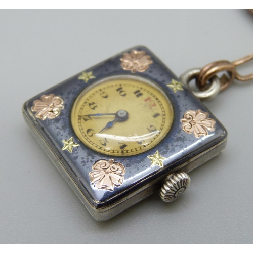 1055 - A Niello silver brooch fob watch with yellow metal decoration and French control marks, 23mm