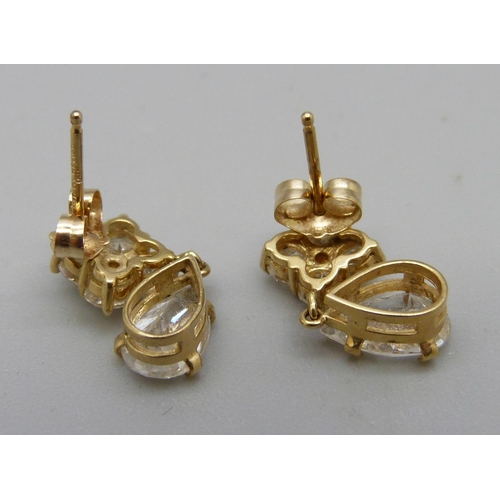 1071 - A pair of 14ct white stone set earrings, 2.2g