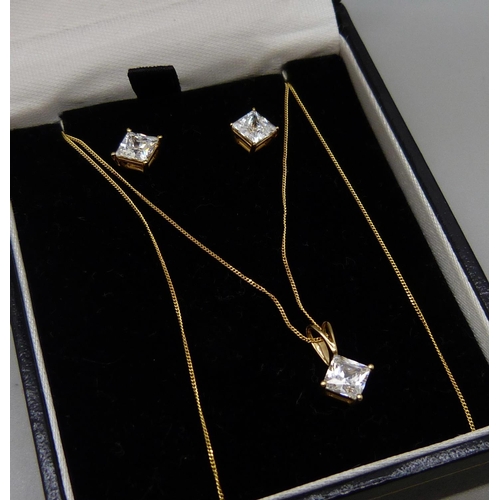 1103 - A 14ct gold pendant and earring set