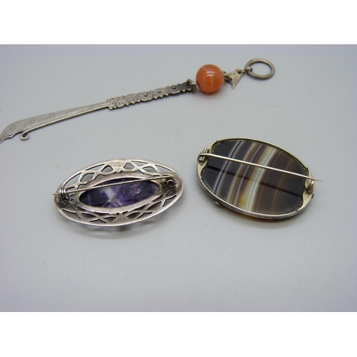 1105 - A hallmarked silver Blue John set brooch, a banded agate brooch and a large pendant, 12cm