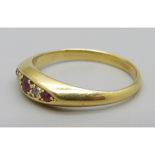 1121 - An 18ct gold, ruby and diamond ring, 3.4g, O