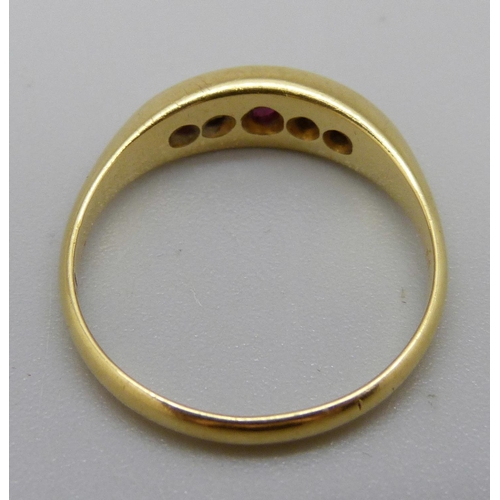 1121 - An 18ct gold, ruby and diamond ring, 3.4g, O