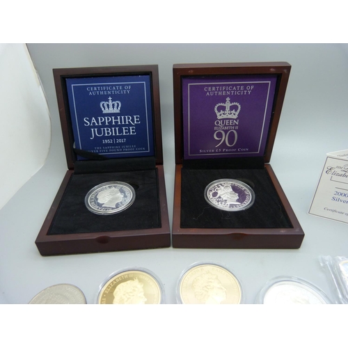 1129 - Two commemorative silver proof £5 coins and other commemorative coins