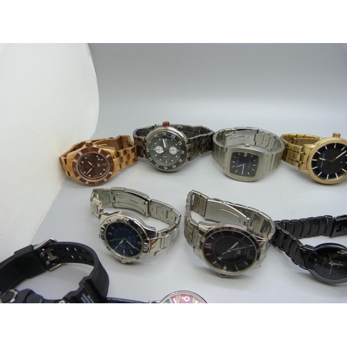 1134 - A collection of wristwatches including Tommy Hilfiger, Casio, Armani Exchange, Invicta, etc.