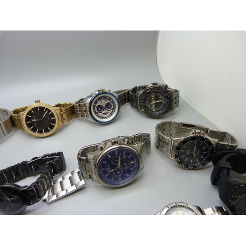 1134 - A collection of wristwatches including Tommy Hilfiger, Casio, Armani Exchange, Invicta, etc.