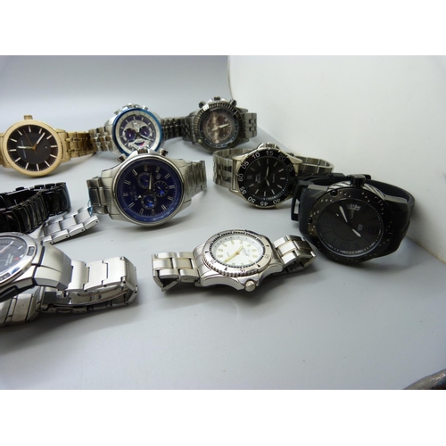 1134 - A collection of wristwatches including Tommy Hilfiger, Casio, Armani Exchange, Invicta, etc.