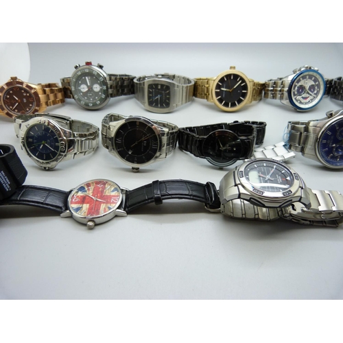 1134 - A collection of wristwatches including Tommy Hilfiger, Casio, Armani Exchange, Invicta, etc.