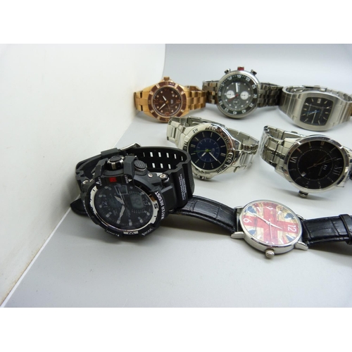 1134 - A collection of wristwatches including Tommy Hilfiger, Casio, Armani Exchange, Invicta, etc.