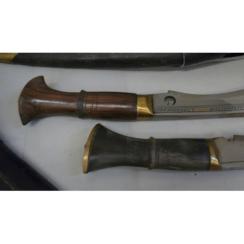 1141 - Two Indian kukris with scabbards