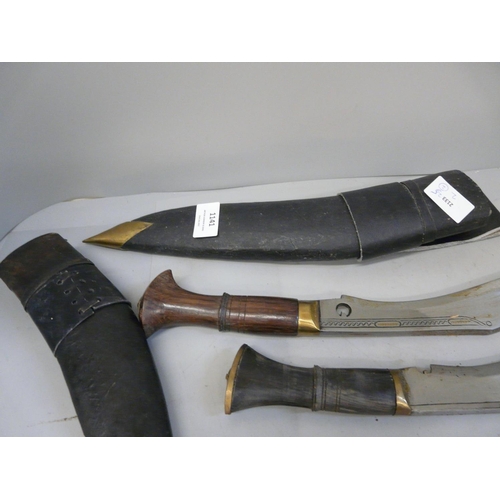 1141 - Two Indian kukris with scabbards