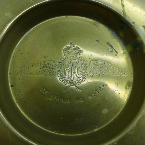 634 - A brass ashtray with Royal Flying Corps insignia