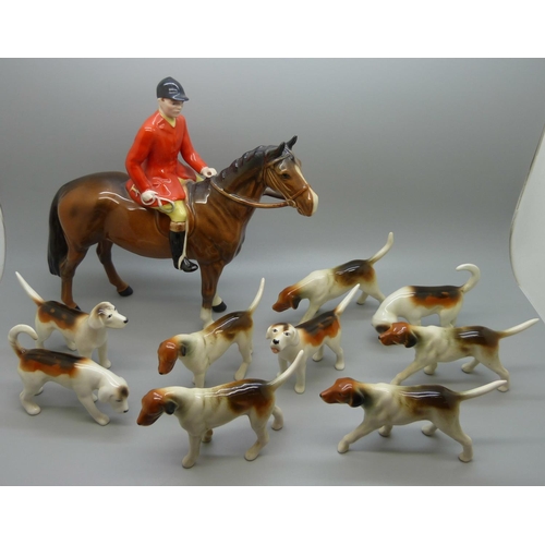 639 - A Beswick Huntsman, no. 1501, four Beswick hounds and five other hounds