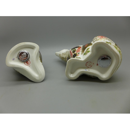 646 - Two Royal Crown Derby paperweights, Polar Bear and Puffin, both with silver stoppers