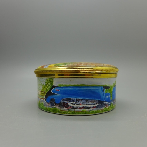 665 - A Moorcroft enamel circular box, locomotive, 7.2cm, (Mallard depicted but named flying Scotsman) lim... 