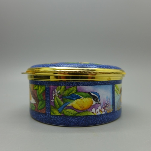 666 - A Moorcroft enamel circular box, British Birds, limited edition 75/150, signed FW, boxed