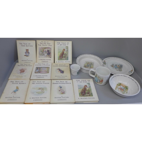 684 - A Wedgwood Peter Rabbit bowl, dish, egg cup and cup and ten Peter Rabbit books, one duplicate