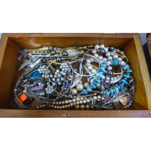 706 - Two wooden boxes of costume jewellery