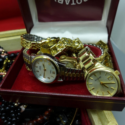 713 - Costume jewellery and wristwatches in a jewellery box