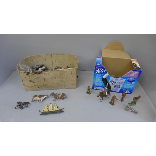 727A - Two boxes of Britains Ltd, Johillco and other lead soldiers and farm animals plus two 'flat' lead sa... 