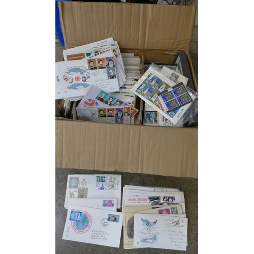 739 - A box of approximately 200 first day covers and loose stamps