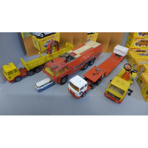 751 - Tweny five boxed Dinky Toys Norev die-cast model vehicles and four Matchbox and Corgi model trucks