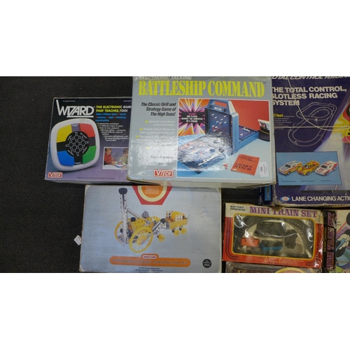 755 - A Meccano Stephenson's Rocket kit, TCR Racing game, VTech Battleship Command and other games **PLEAS... 