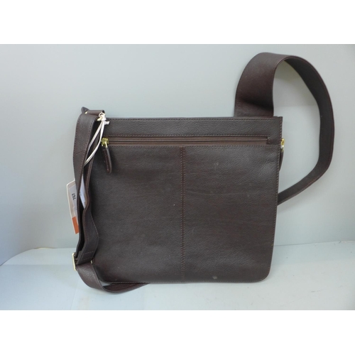 767 - A lady's Radley brown leather handbag, with inner pockets, 30cm x 27cm