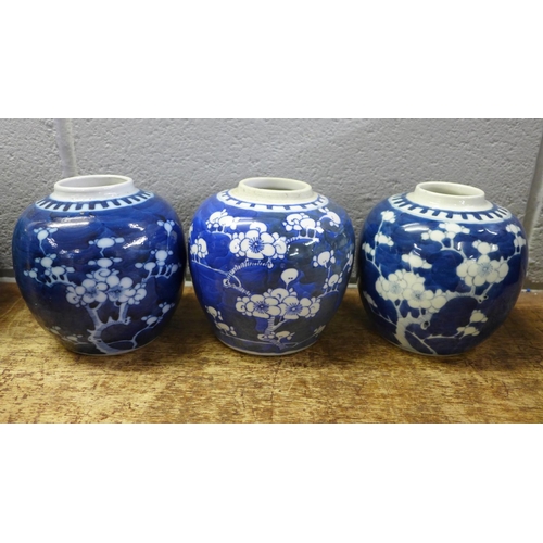 842 - A Chinese blue and white table lamp base and three prunus blossom ginger jars lacking lids