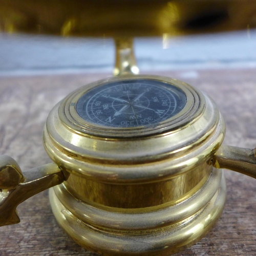 846 - A gem set inlaid globe on brass stand