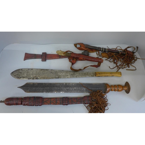 854 - African knives and daggers, including 19th Maasai herder sword and a tribal leader sword