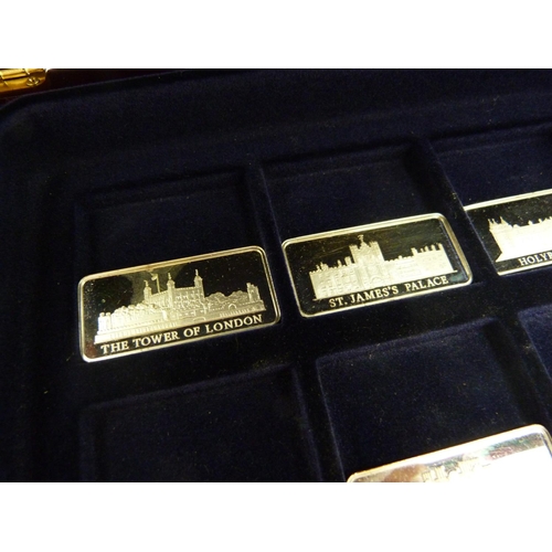 858 - A cased set of twelve silver ingots, Palaces of Great Britain, 381.5g, marked on the rims