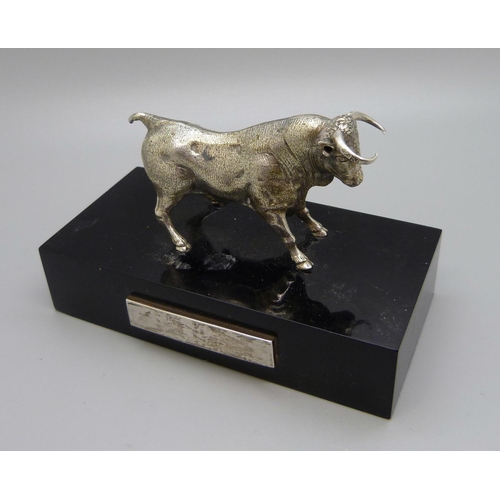 860 - A silver covered model bull, Spanish marks on the horns, base 11cm