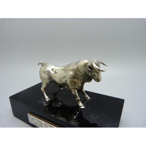 860 - A silver covered model bull, Spanish marks on the horns, base 11cm