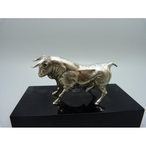 860 - A silver covered model bull, Spanish marks on the horns, base 11cm