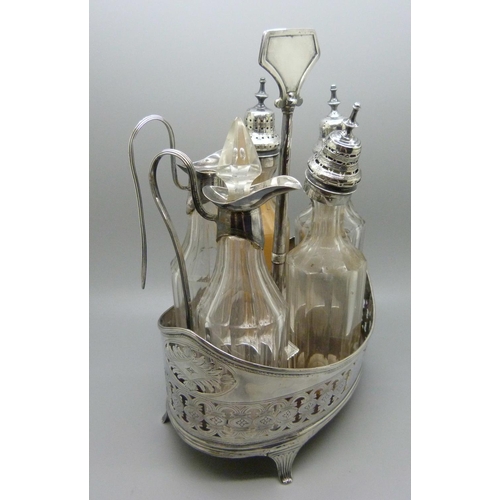 866 - A William IV silver navette shaped condiment stand with five bottles, London 1832, Charles Fox I, th... 