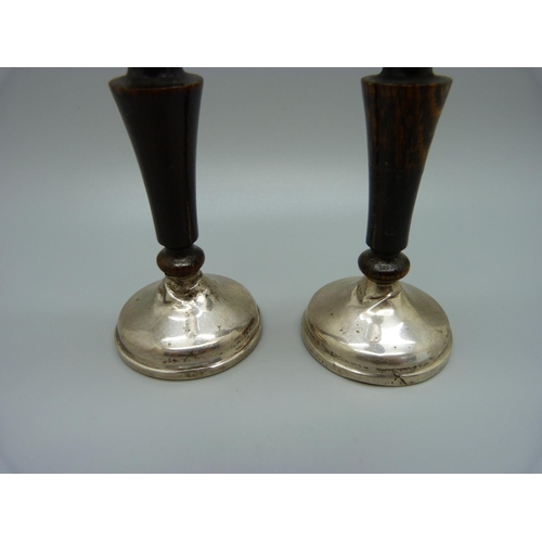 882 - A pair of silver and wood candlesticks, a/f, 12cm