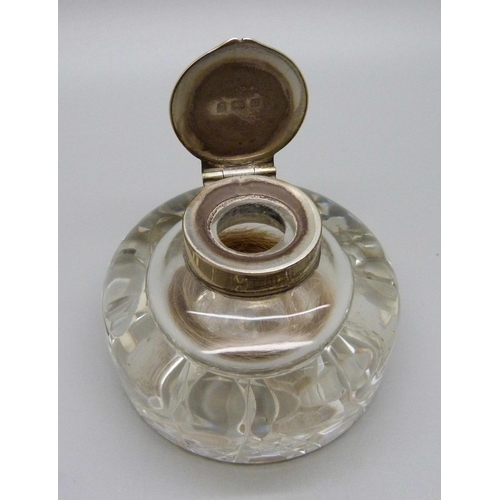 887 - A silver topped glass paperweight/inkwell, Birmingham 1902