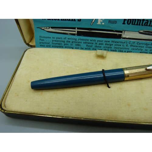 896 - A Watermans cartridge fountain pen with rolled gold lid and 14ct gold nib