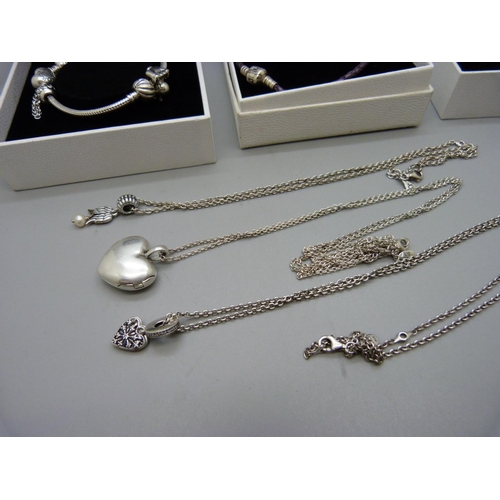 900 - Pandora jewellery; charm bracelet, ring and three chains with pendants