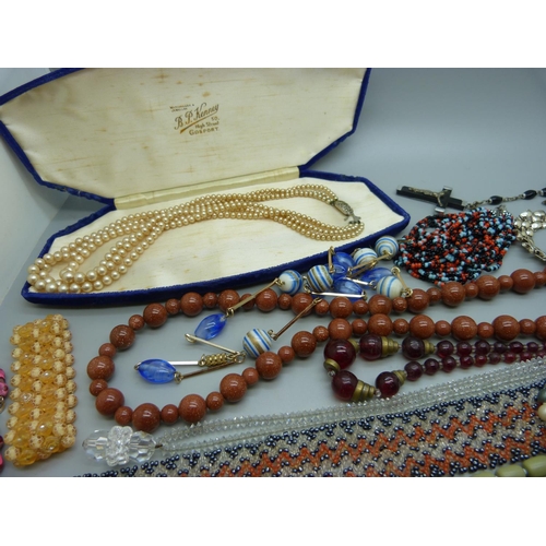 921 - Vintage bead necklaces including a goldstone necklace