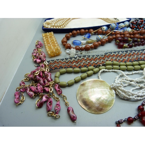 921 - Vintage bead necklaces including a goldstone necklace